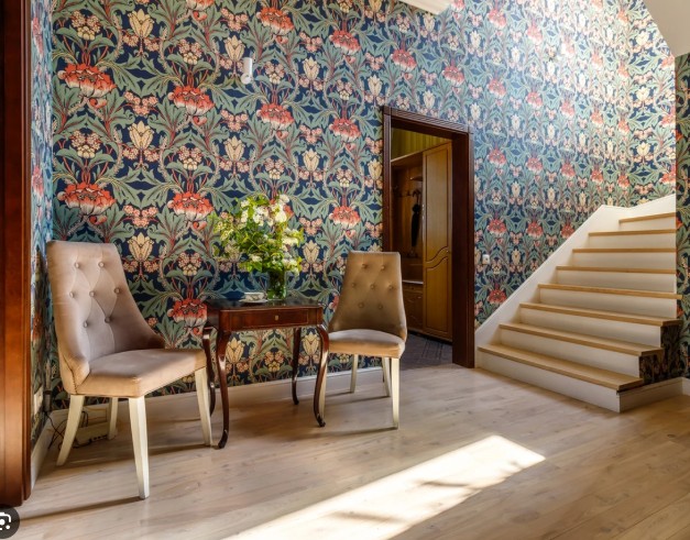 Floral feature wallpaper hung in a hallway